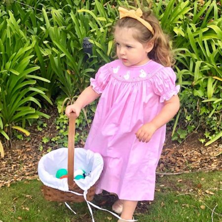 Spencer's eldest daughter, Bea in her pink dress